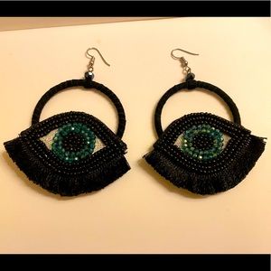 Large eye earrings